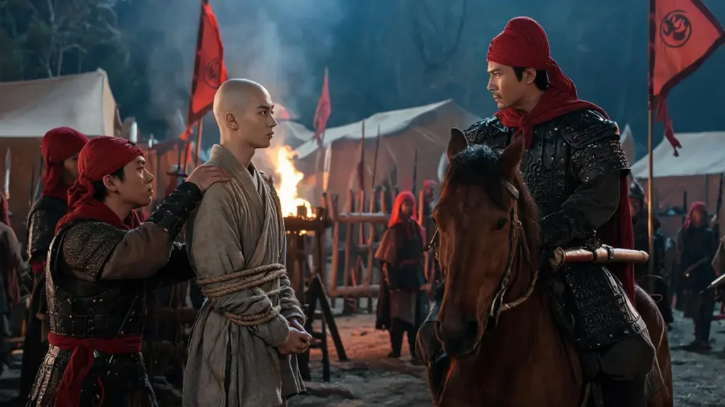 A young Zhu Yuanzhang in monk robes, bound with ropes, being examined by the Red Turban warlord Guo Zixing on horseback at a rebel camp outside Haozhou, 1352
